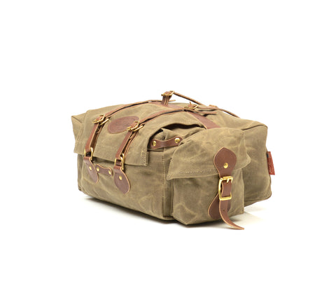 The durable waxed canvas will protect from abrasions and debris when on the trail.