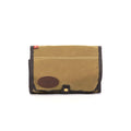 All three colors of the travel kits are made from a durable light weight waxed canvas.