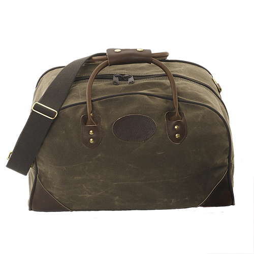 Travel luggage bag, handmade with waxed canvas. Featuring a cotton webbed, adjustable shoulder strap.