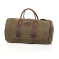 Waxed canvas, rounded duffle bag, with premium leather grab handles.