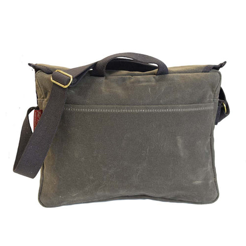 On the back of the Tettegouche Messenger Bag is an additional slip sleeve. There is also a tough webbed cotton handle to easily grab this bag. 