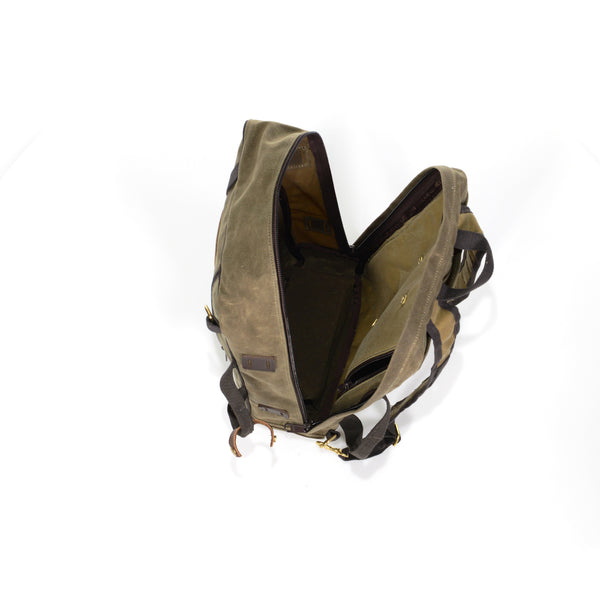 Inside this spacious pack there is one zippered padded sleeve on the back with four brass snaps for accessories. 