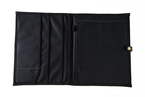 Also available in our Heritage Black, there are several sleeve pockets on the left side and one large sleeve pocket on the right.
