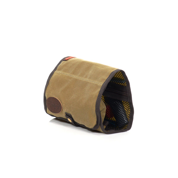 The travel kit has an easy to snap closure to keep items secure when rolled up and packed in a suitcase or travel bag.