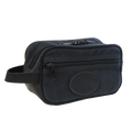 The travel kit has a nice rectangular shape that allows it to sit up own it's own and have an open main compartment closed by a coil zipper, as well as, a side zippered pocket.