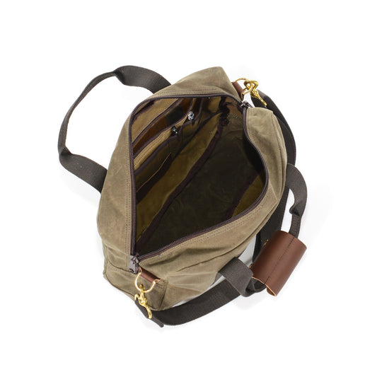 Inside the Simple Brief contains a main compartment with several small pockets and a zippered slip pocket on the side.