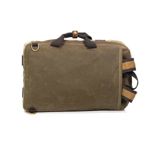 Additionally on the backside of this pack there is one slip sleeve to tuck away the backpack straps when needed.