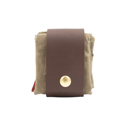 Expandable waxed canvas and leather belt pouch designed for foraging