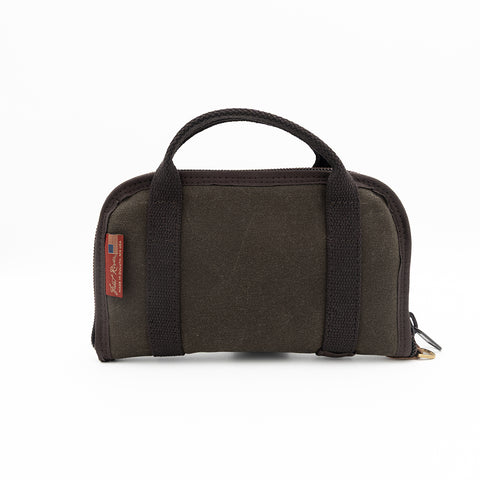 backside of small waxed canvas pistol rug case