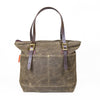 Backside view of a waxed canvas Boardwalk Tote. 