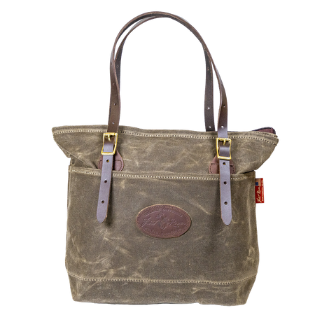 Waxed canvas and leather tote bag designed for everyday use.