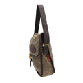 Side view of a waxed canvas messenger bag