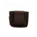 This belt pouch is crafted from waxed canvas, full-grain leather, and a solid brass button snap. 