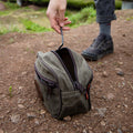 Waxed Canvas and leather dopp kit being used as a tool bag.