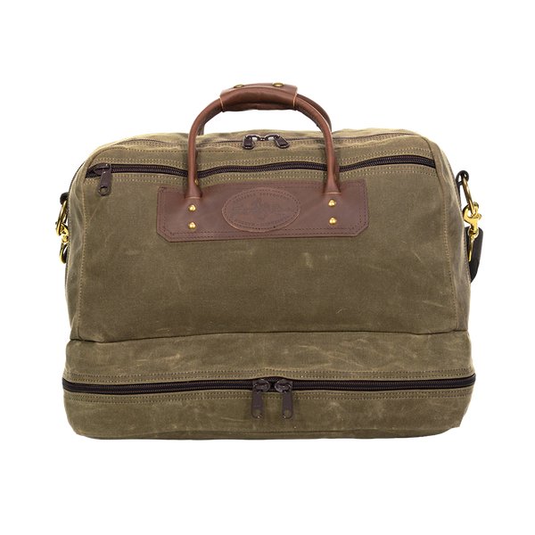Waxed Canvas and leather duffel bag with a separate compartment for boots or dirty clothes. 