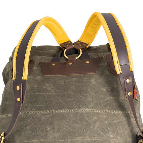 Rear view of vintage pack shown with buckskin straps. 