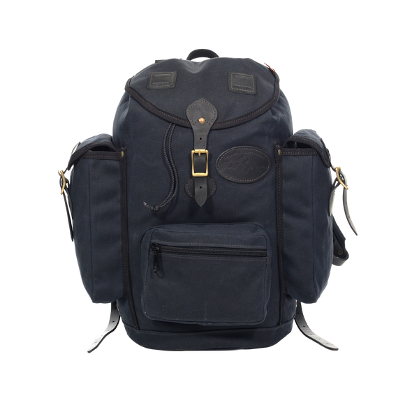The Summit Expedition backpack in heritage black is crafted with waxed canvas, premium leather, and high quality brass.