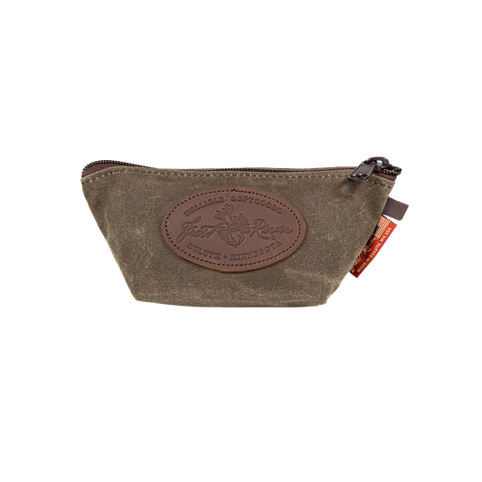 Brown handcrafted leather pouch with a zipper and logo on the front.