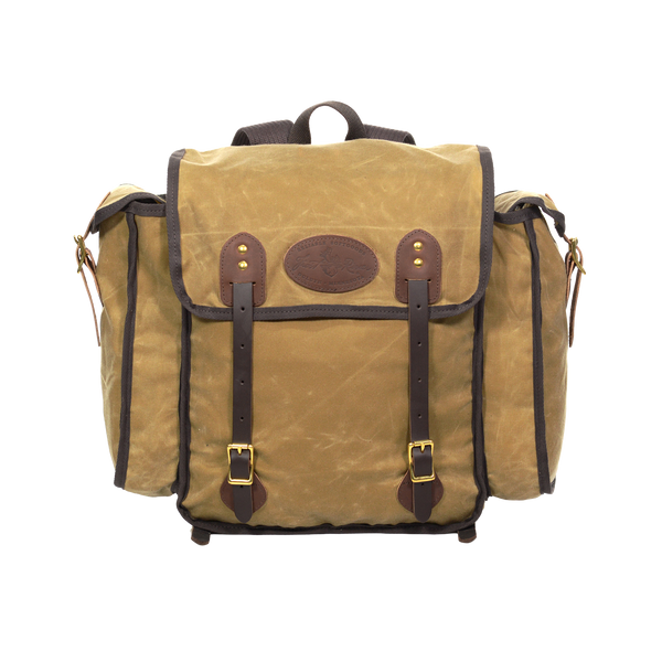 The Cliff Jacobson is a light weight tan colored box style pack. With two leather straps in the front to secure your load. Handcrafted in Duluth, MN.