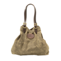 Large tote with adjustable leather straps connected with solid brass buckles.