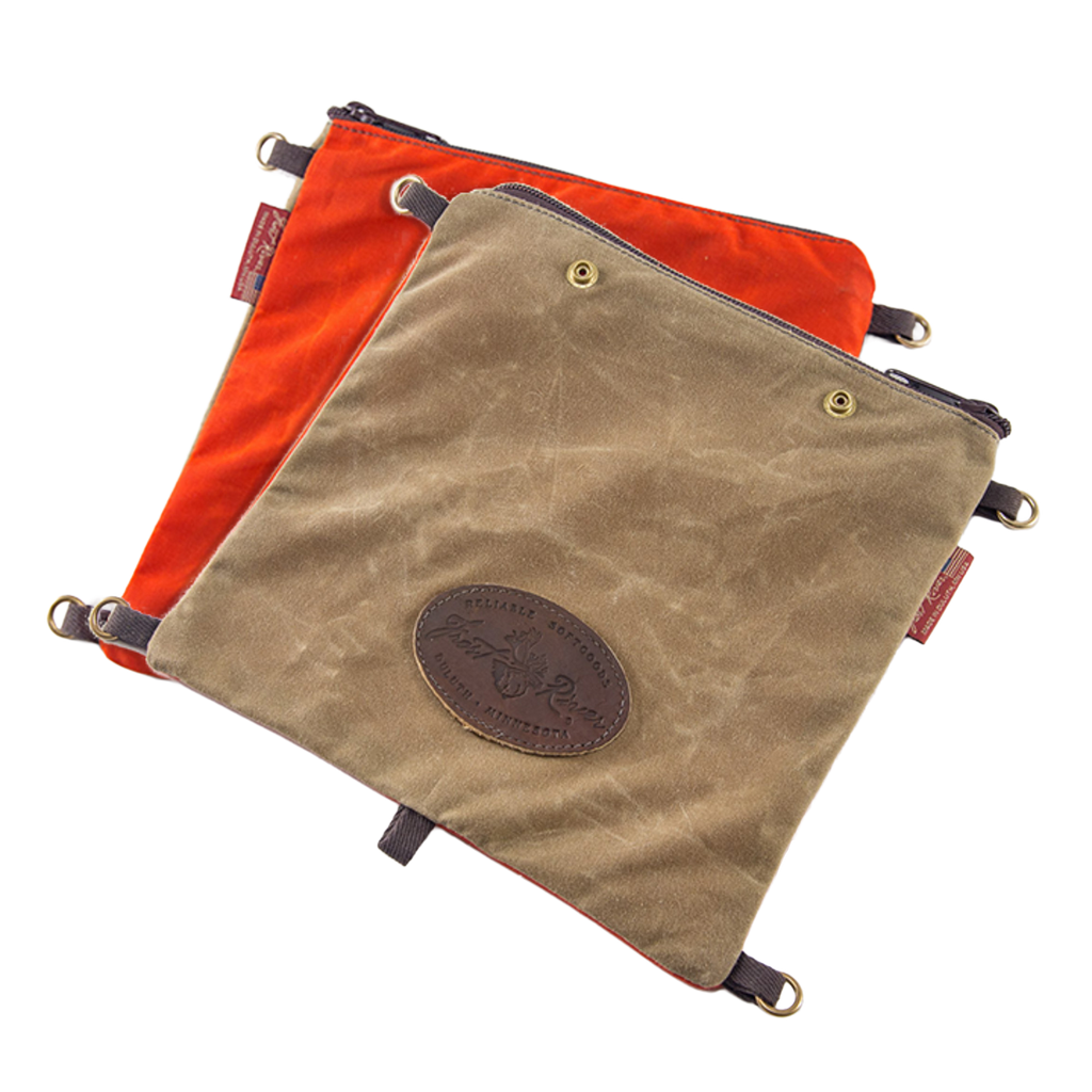 The Windigo Signal Bag is a great addition to any of our packs.  One side is made from our field tan waxed canvas and the other is made from our hunters orange waxed canvas.
