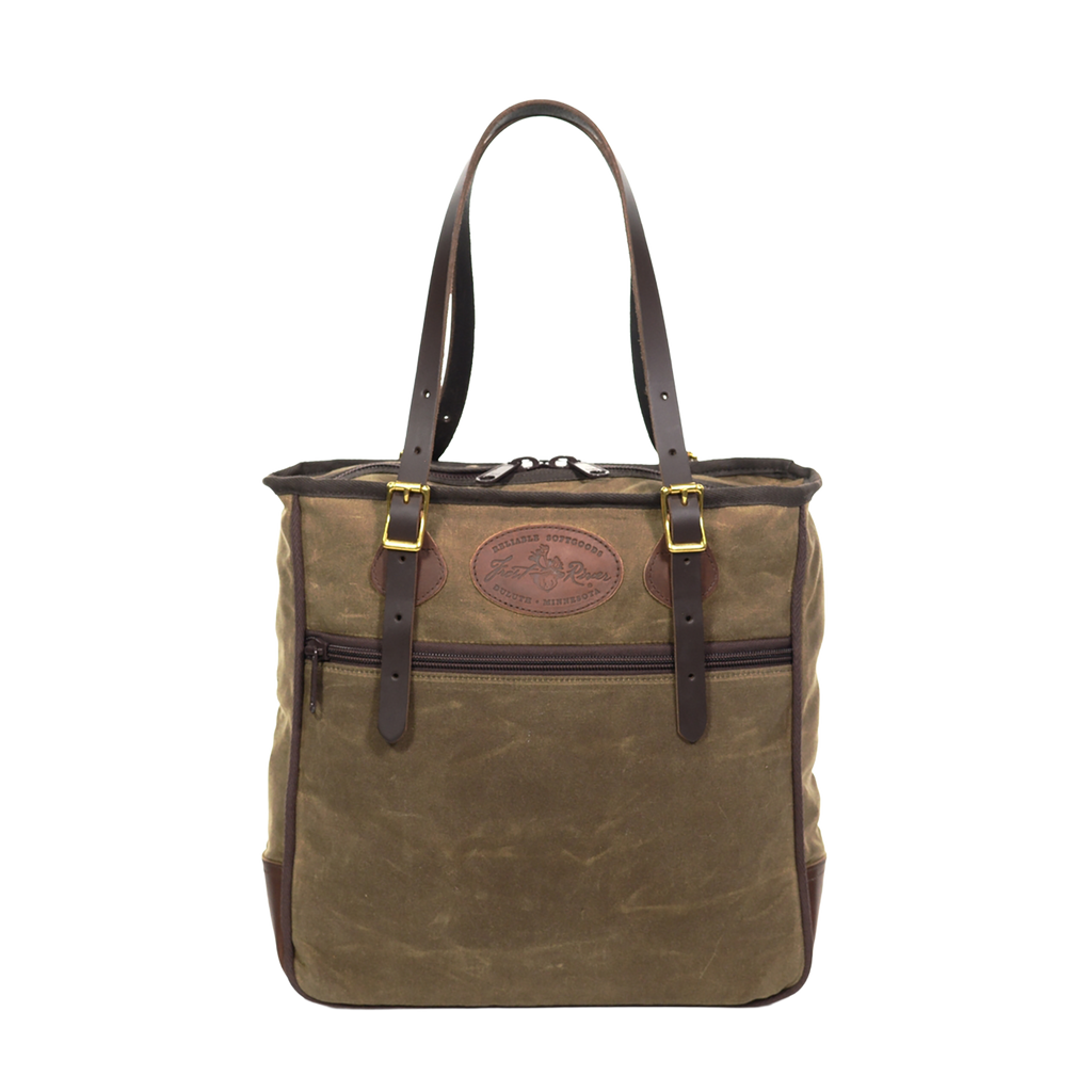 Large tote bag with adjustable leather straps connected with solid brass 