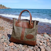 Handcrafted tote sits on the shores of Lake Superior. 
