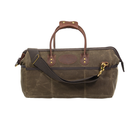 Handcrafted tool bag with a cross body shoulder strap system.