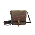 Timeless shoulder bag made from waxed canvas, premium leather, and solid brass.