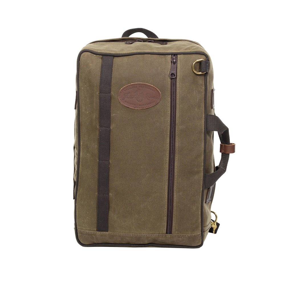 Vertically, on the front of this bag there are several cotton loops and one brass D ring for accessories. Additionally there is one zipper that runs the length of bag. Made out of our high quality Field Tan waxed canvas. Made in Duluth, MN.