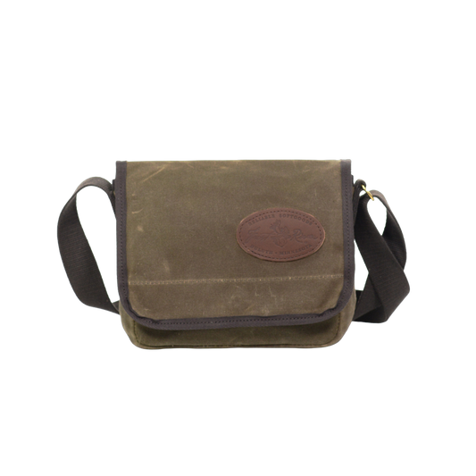 This small to medium sized satchel is handcrafted out of high quality waxed canvas, strong webbed cotton,  solid brass, and premium leather. 
