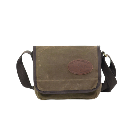 This small to medium sized satchel is handcrafted out of high quality waxed canvas, strong webbed cotton,  solid brass, and premium leather. 