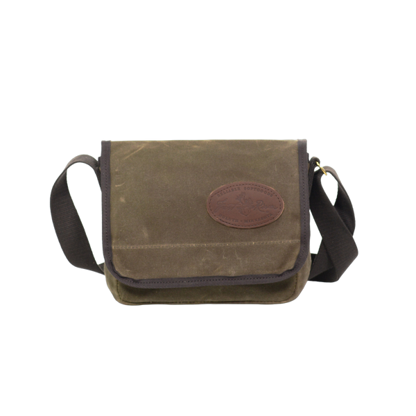 This small to medium sized satchel is handcrafted out of high quality waxed canvas, strong webbed cotton,  solid brass, and premium leather. 