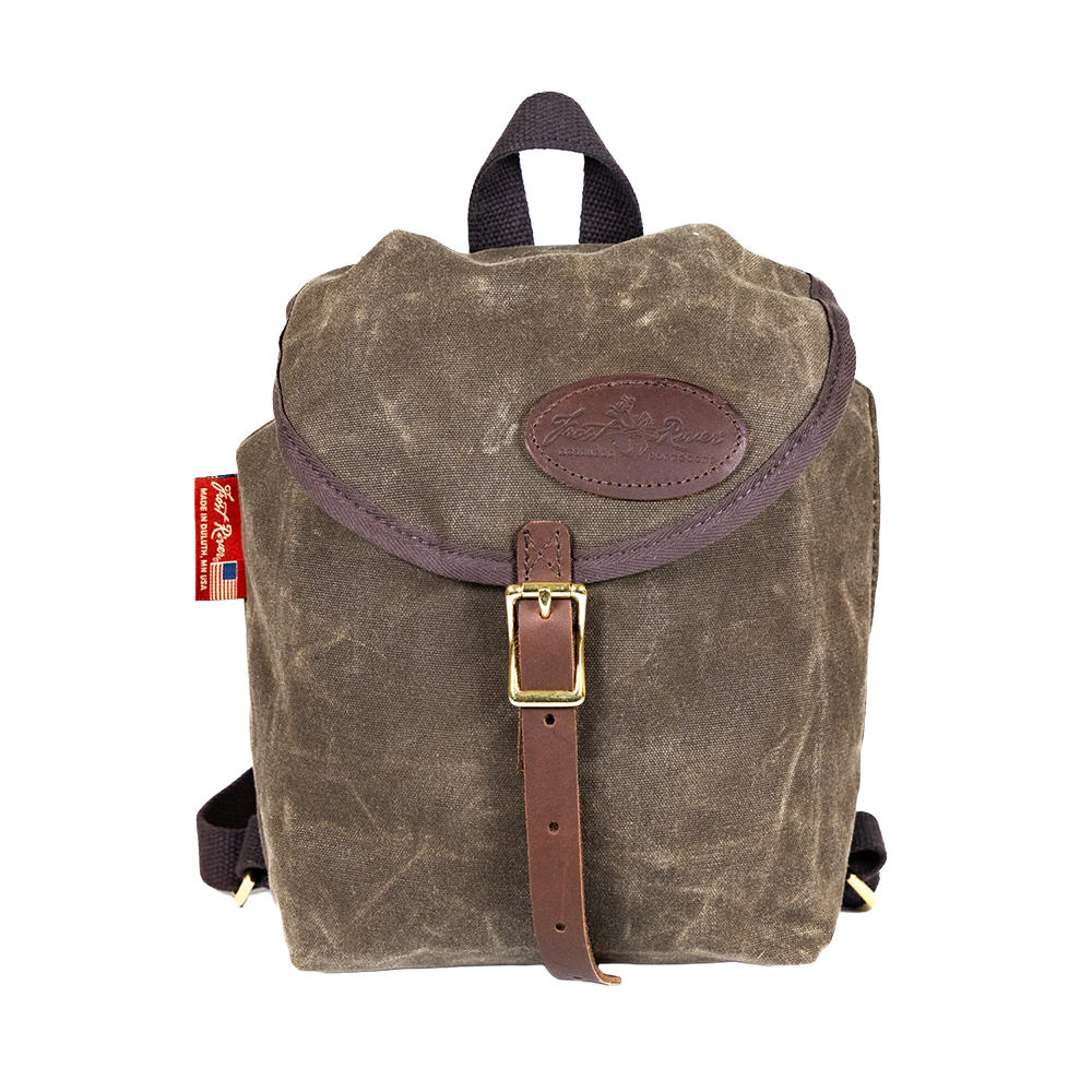A small waxed canvas knapsack crafted in Duluth, Minnesota. 