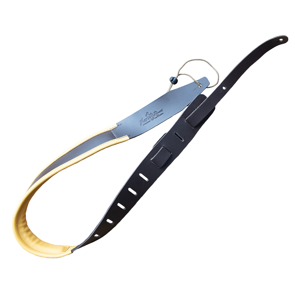 A black leather guitar strap with padded lining. 