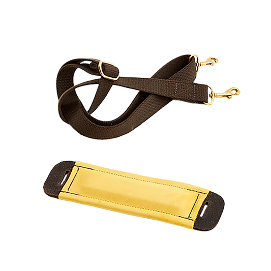 A black leather shoulder strap with brass hardware and a gold-colored buckskin pad.