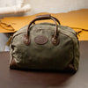 Frost River's Flight Bag duffel that is made from waxed canvas and leather. 