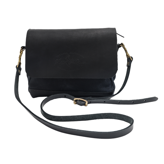 Shoulder bag made from lack leather and waxed canvas