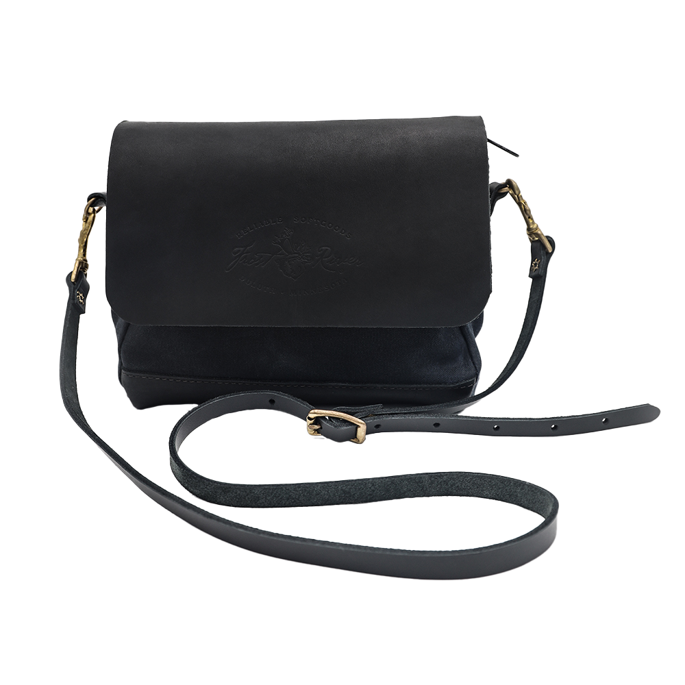 Shoulder bag made from lack leather and waxed canvas
