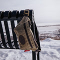 Hip pack sitting on a park bench