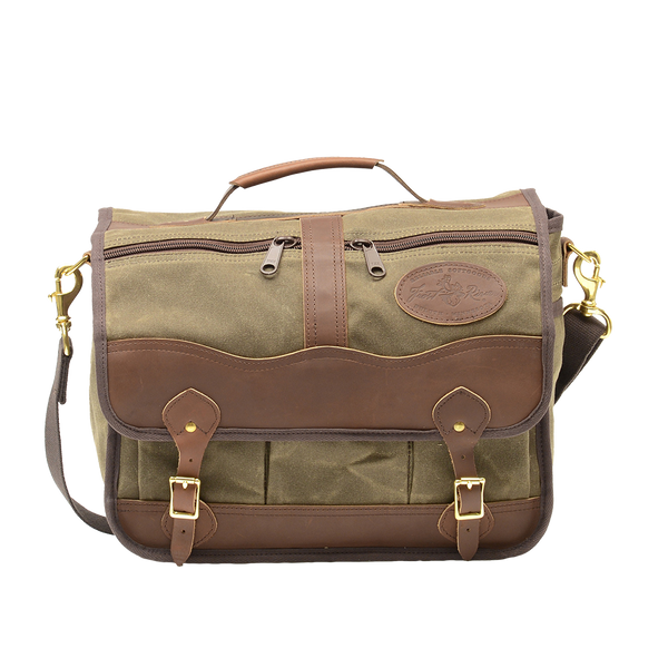 Brown leather and waxed canvas briefcase  crafted with solid brass hardware. 