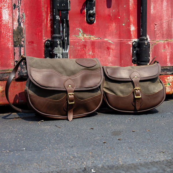 Medium and large premium shell bags sitting next to each other. 