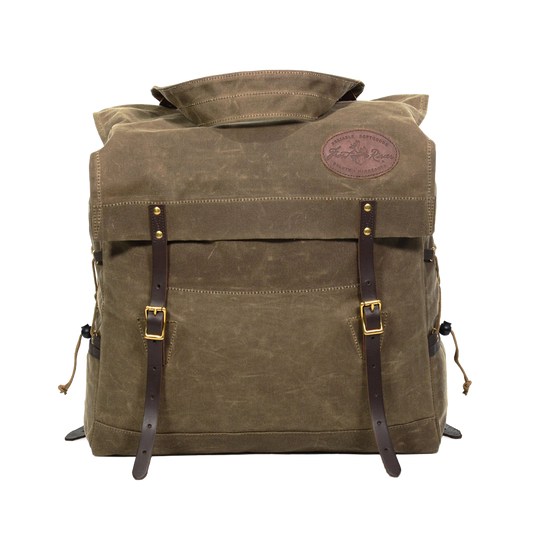 A traditional styled waxed canvas canoe pack called the Woodman Pack made by Frost River.