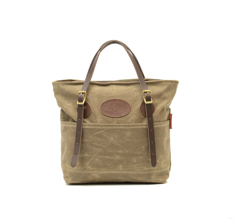 The tote has a high quality coiled zipper closure for the main compartment.