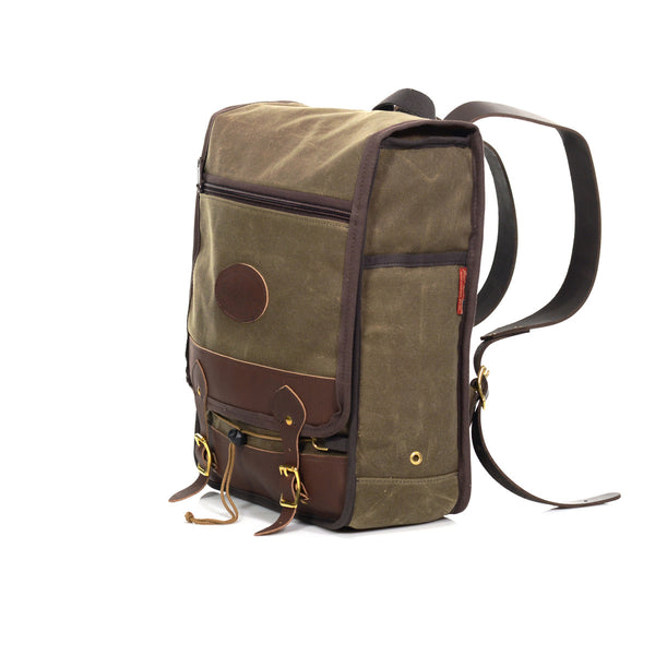 The Premium Mesabi Range Daypack has premium leather straps that are connected to the bottom where you can adjust the backpack straps. Handcrafted in Duluth, MN.