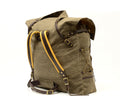 The sides of this big pack have small slip pockets on the bottom and just above a cord and barrel tie down system.