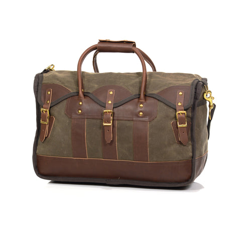 Unique luggage bag, made with premium leather and durable waxed canvas.