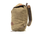 Side view of this large ruck sack that shows it can carry a large load handmade by Frost River Trading Co.