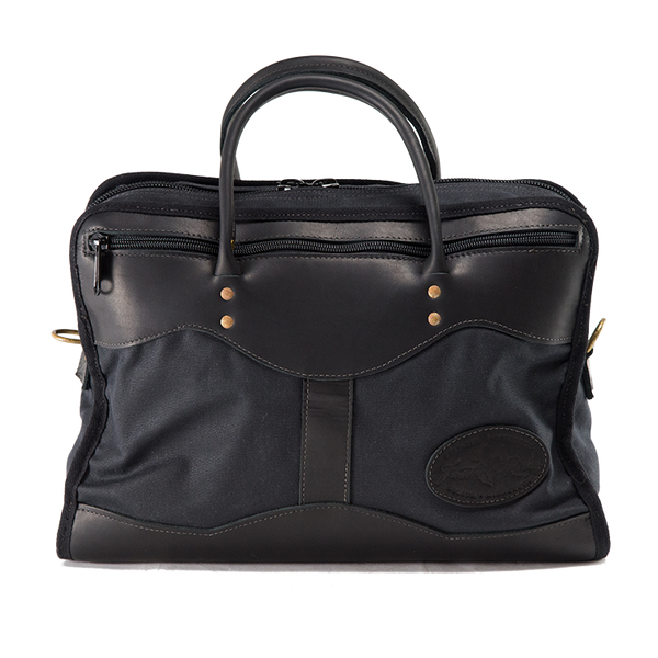 The Single Briefcase is also available in our signature Heritage Black still with all the premium leather, high quality brass, and top-end waxed canvas.
