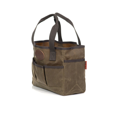 All edges of the tote, including the pockets, are lined with durable cotton binding to protect from abrasion and wear.